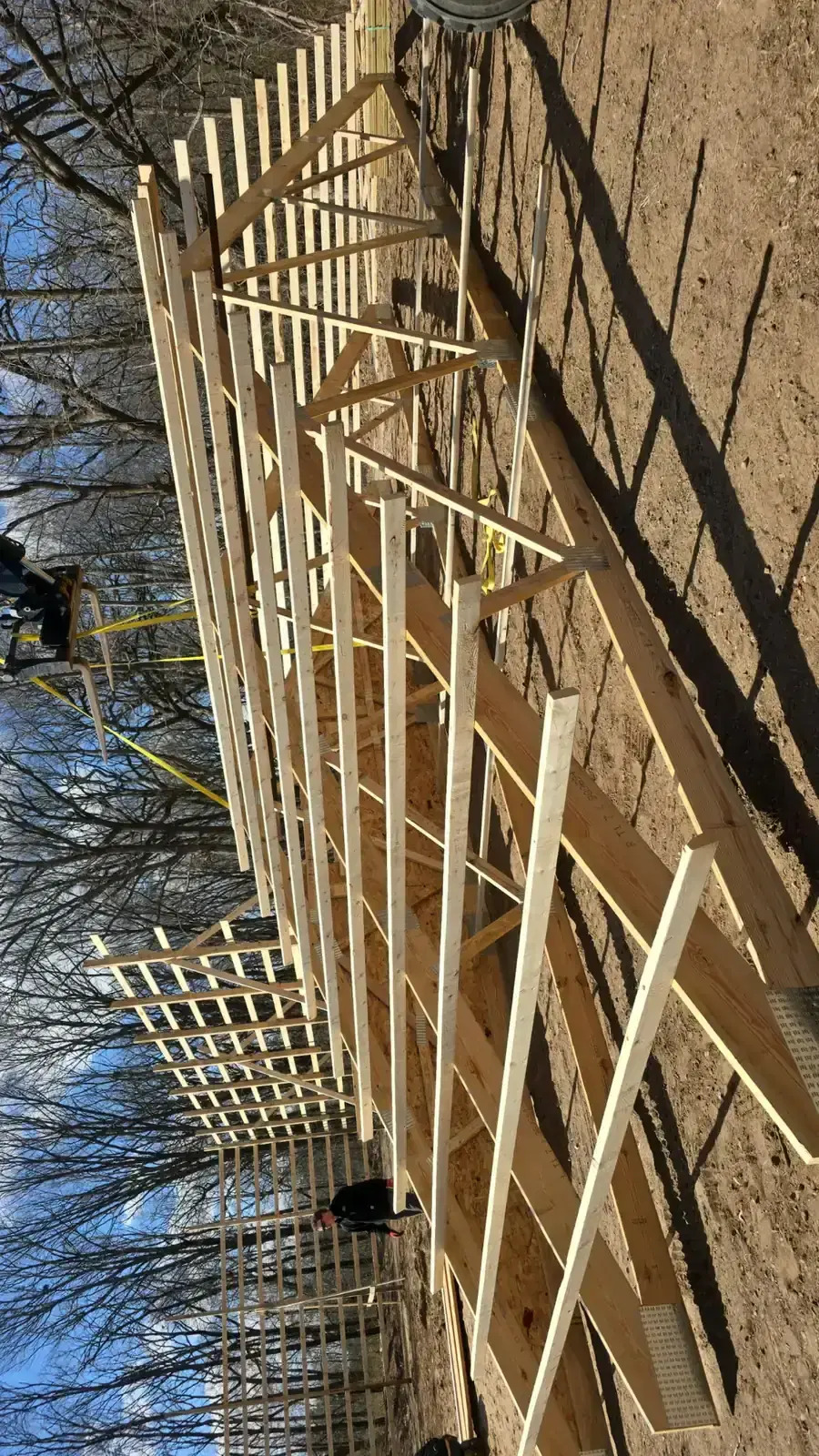 Sports building roof structure for basketball court height